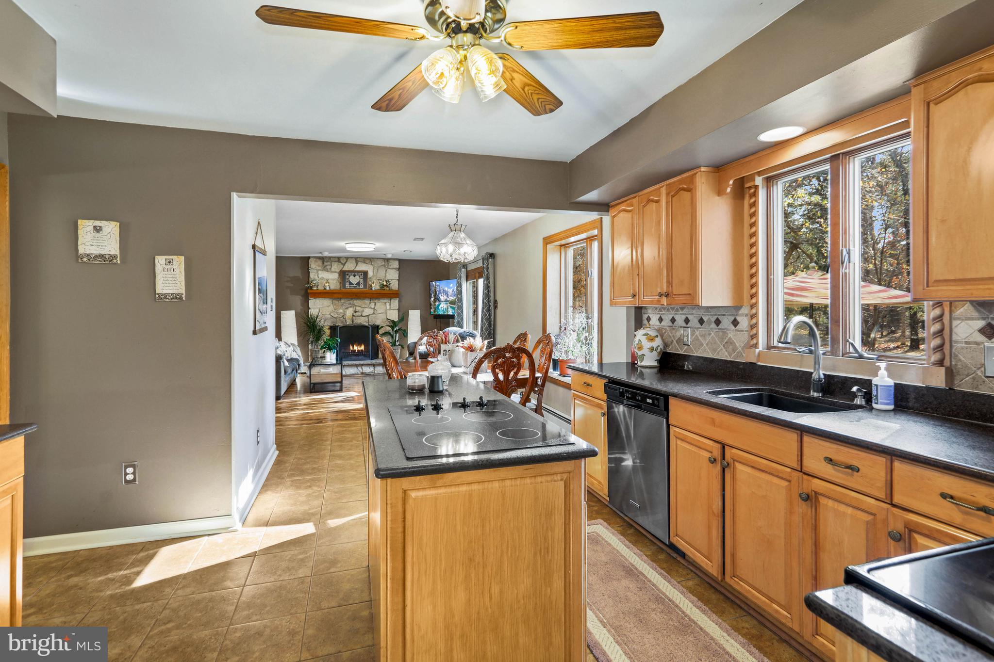 151 Patty Bowker Road Tabernacle, NJ 08088 - Photo 16 of 52 a kitchen with counter top space cabinets and a chandelier