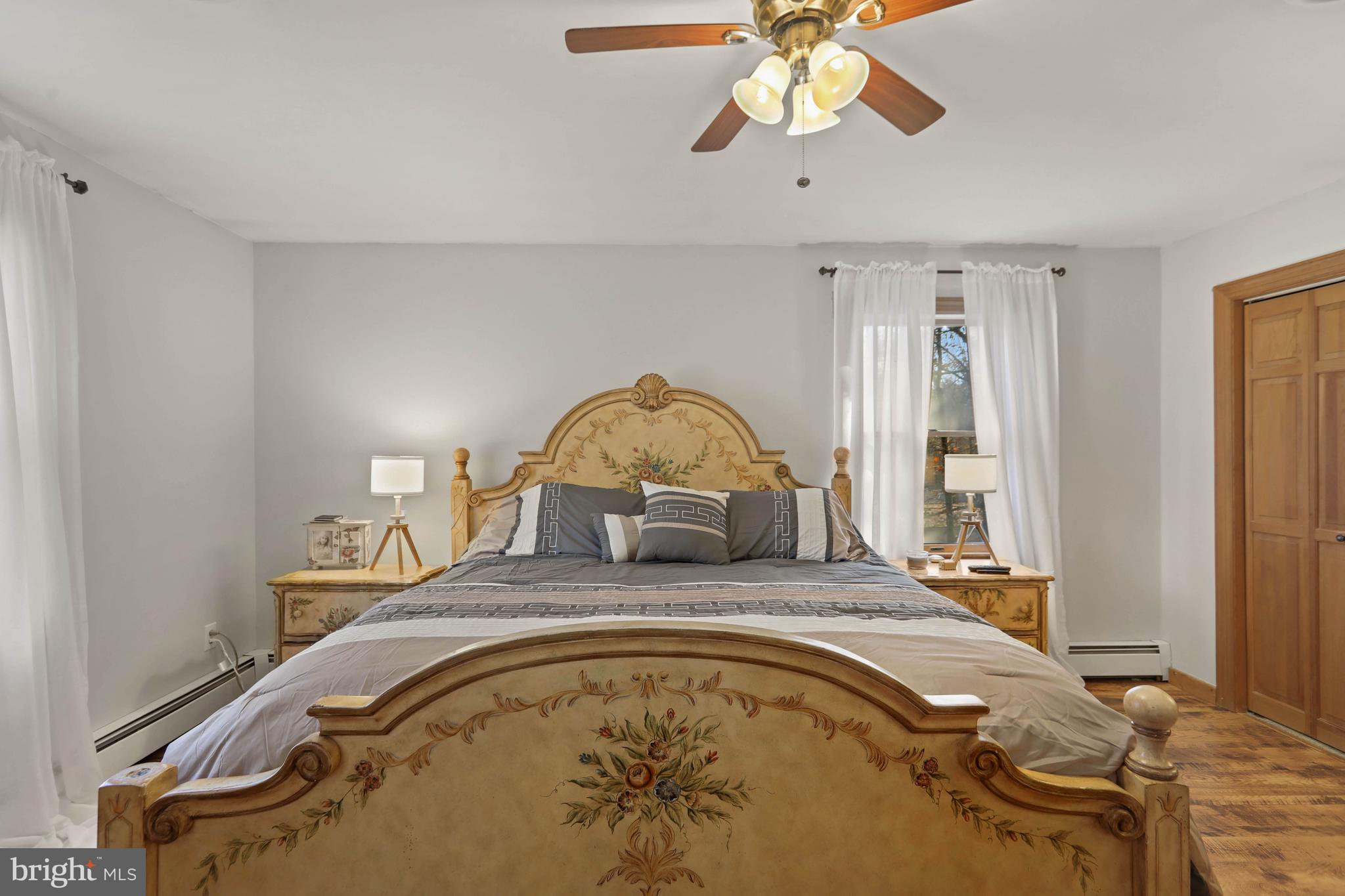 151 Patty Bowker Road Tabernacle, NJ 08088 - Photo 31 of 52 a bedroom with a bed and a chandelier