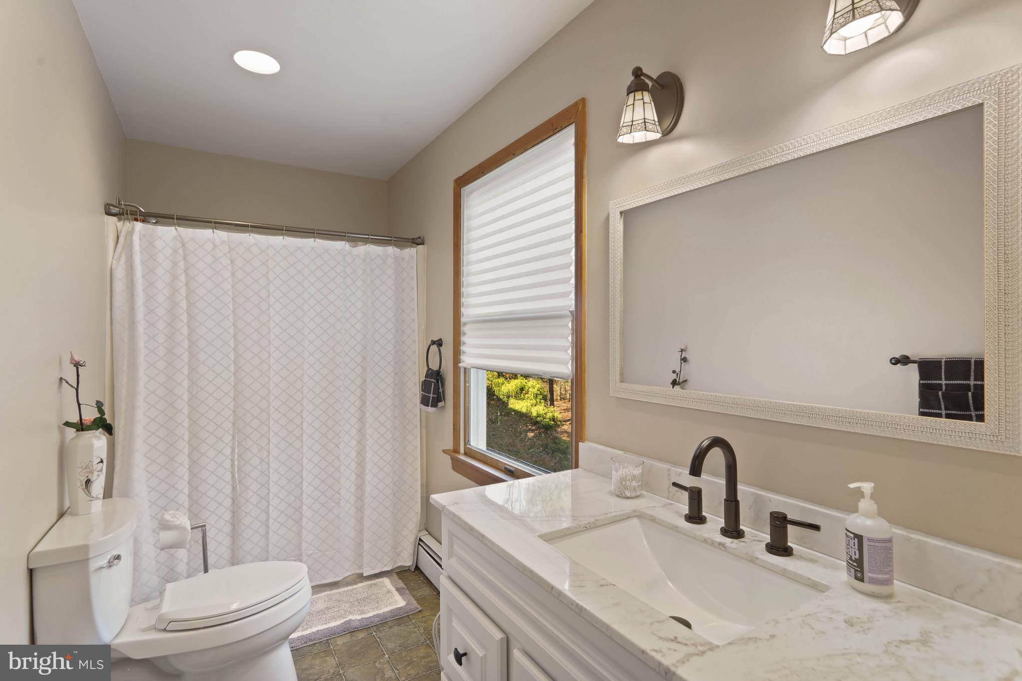 151 Patty Bowker Road Tabernacle, NJ 08088 - Photo 32 of 52 a bathroom with a sink toilet and shower