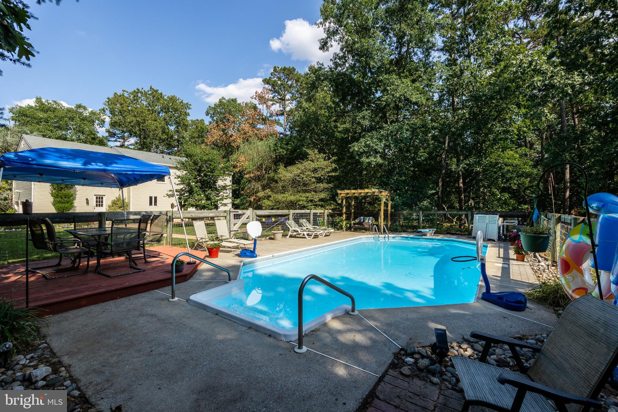 151 Patty Bowker Road Tabernacle, NJ 08088 - Photo 37 of 52 a view of a swimming pool with a patio