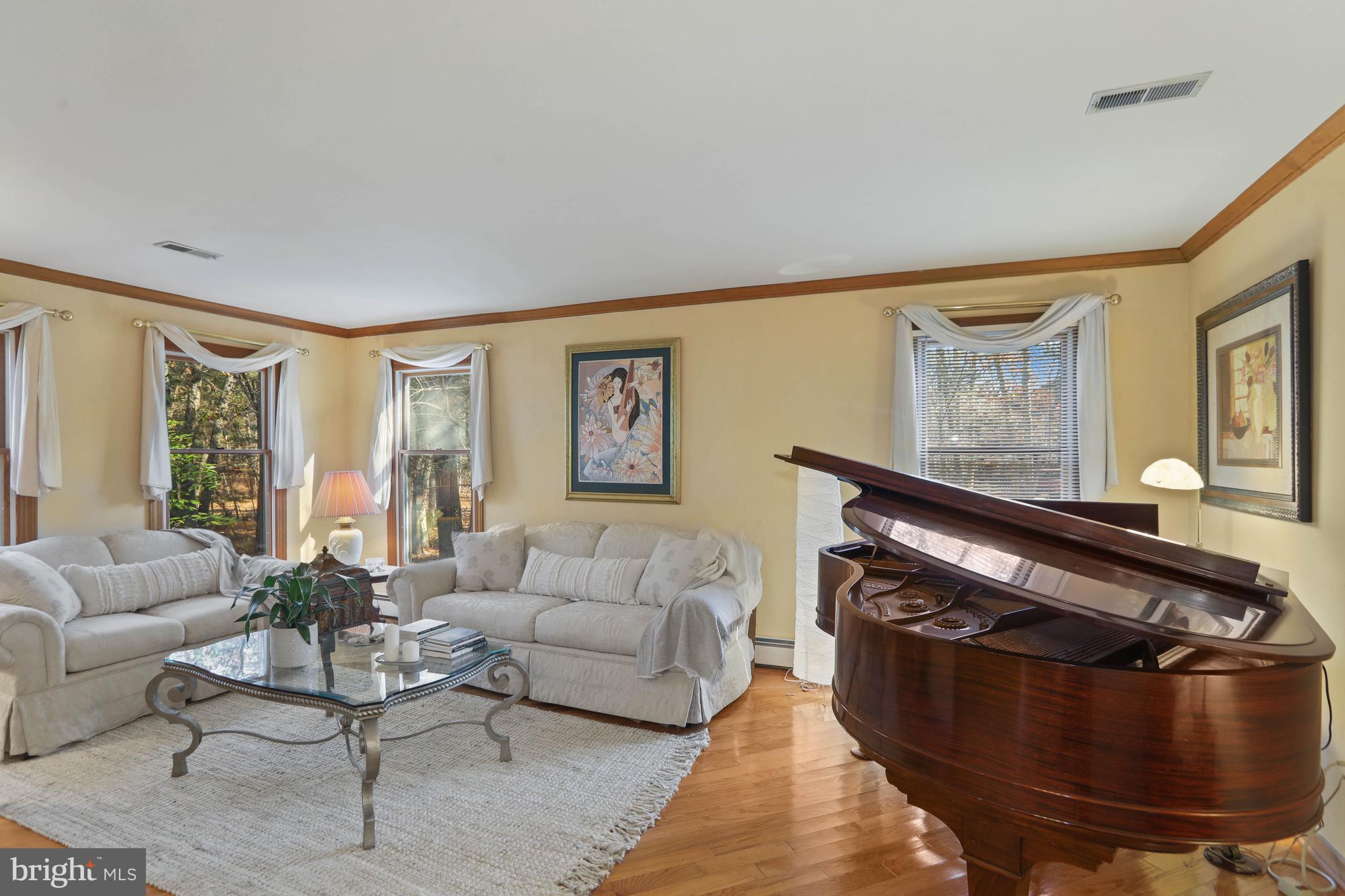 151 Patty Bowker Road Tabernacle, NJ 08088 - Photo 8 of 52 a living room with furniture and a large window
