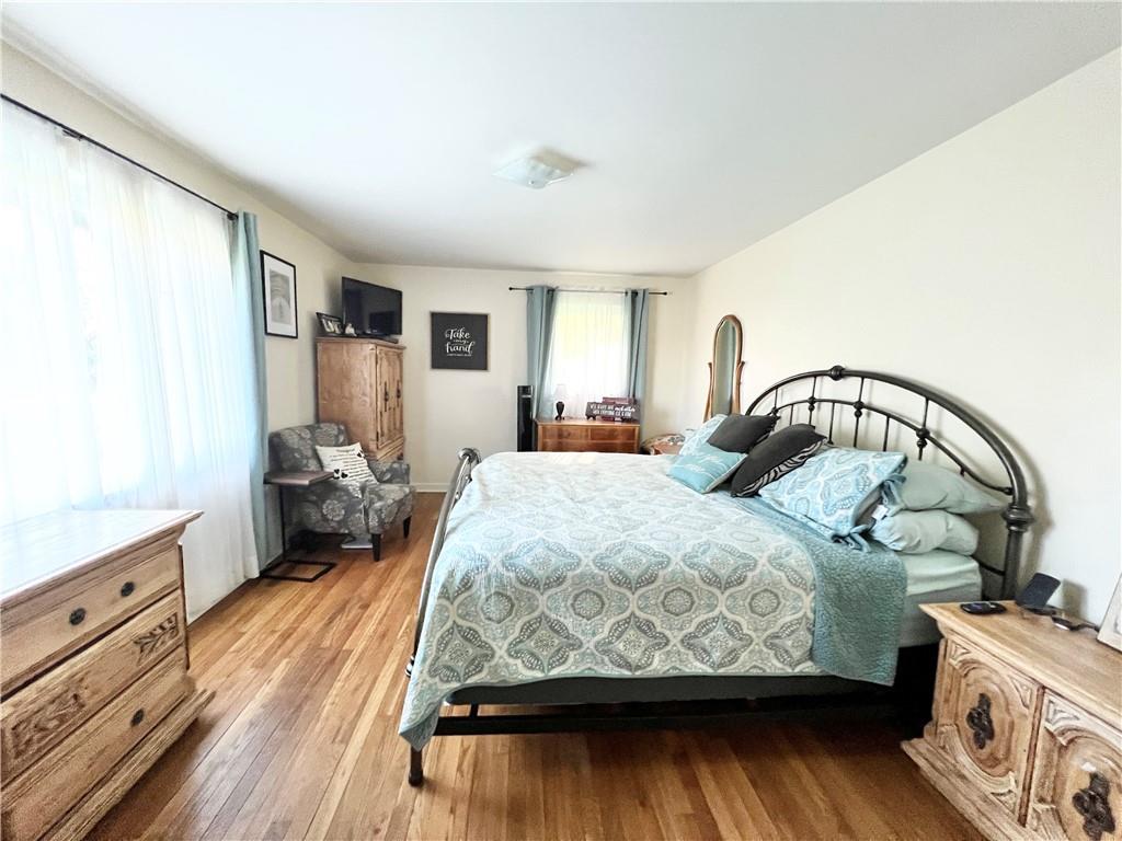 2175 Frew Mill Road New Castle, PA 16101 - Photo 15 of 25 a bedroom with a bed and a dresser