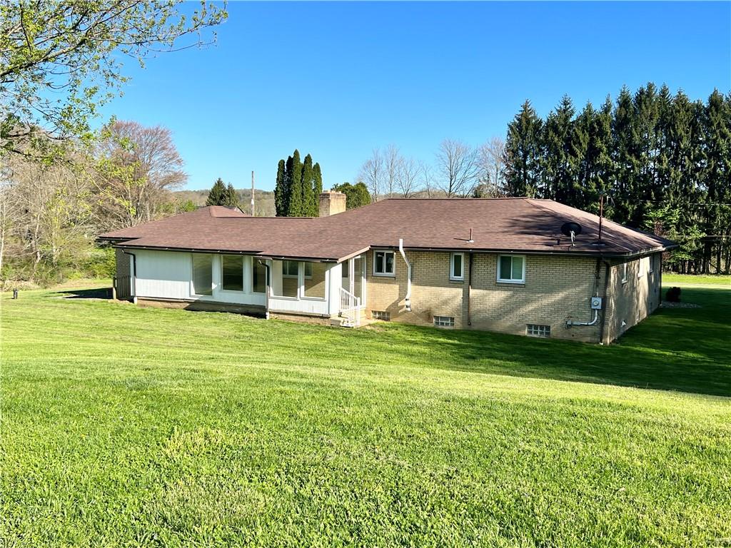 2175 Frew Mill Road New Castle, PA 16101 - Photo 23 of 25 a front view of a house with a garden
