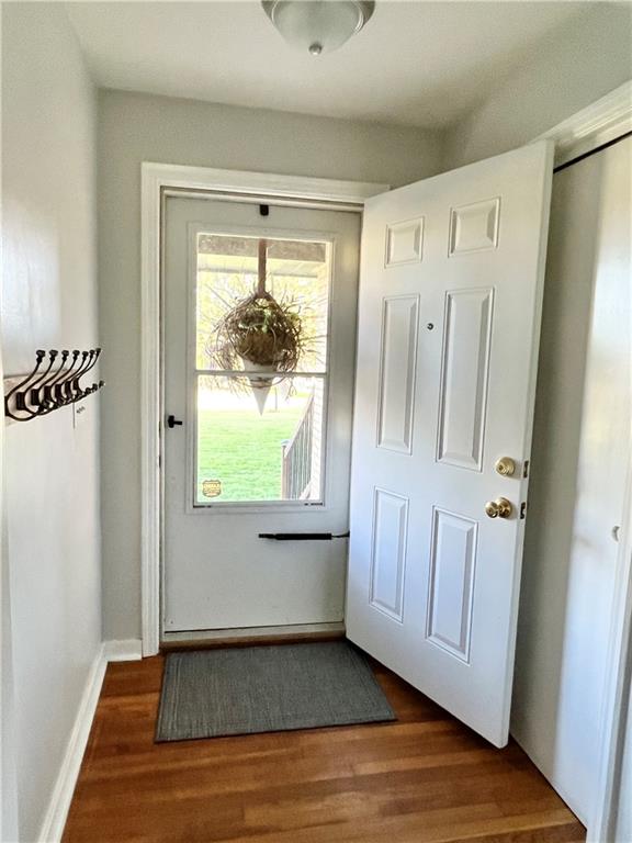 2175 Frew Mill Road New Castle, PA 16101 - Photo 4 of 25 a view of a hallway with wooden floor and a window