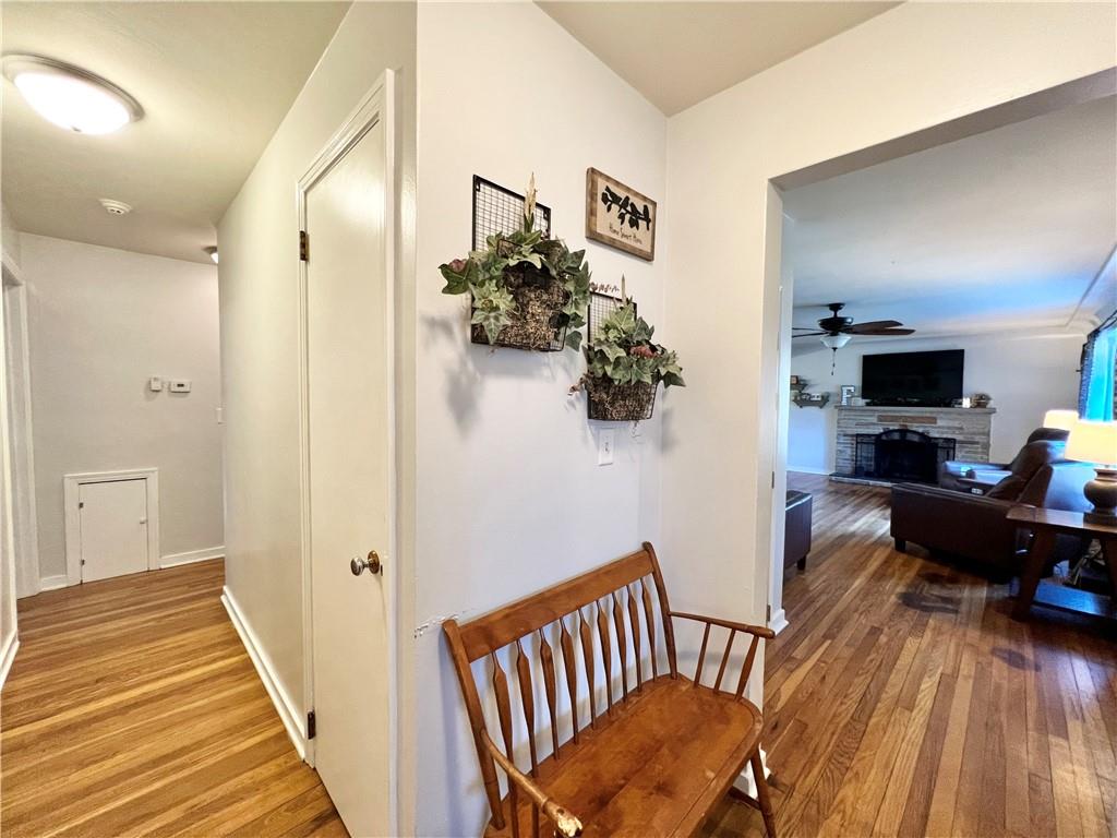 2175 Frew Mill Road New Castle, PA 16101 - Photo 5 of 25 a view of a hallway with furniture and wooden floor