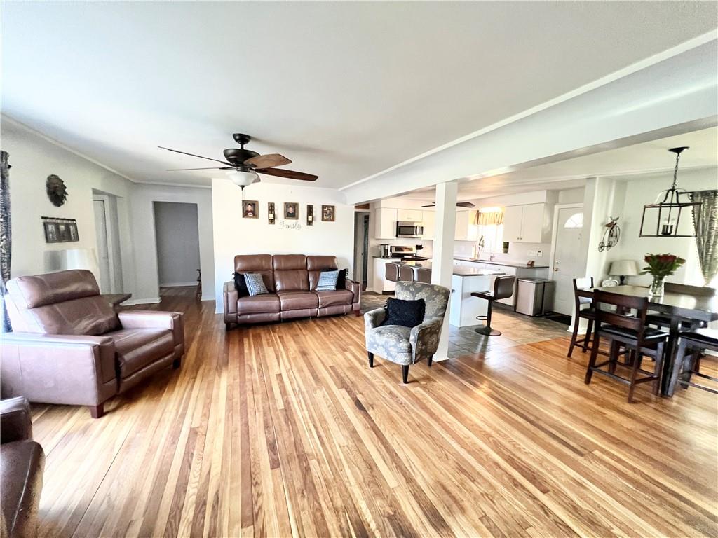 2175 Frew Mill Road New Castle, PA 16101 - Photo 6 of 25 a living room with furniture and a wooden floor