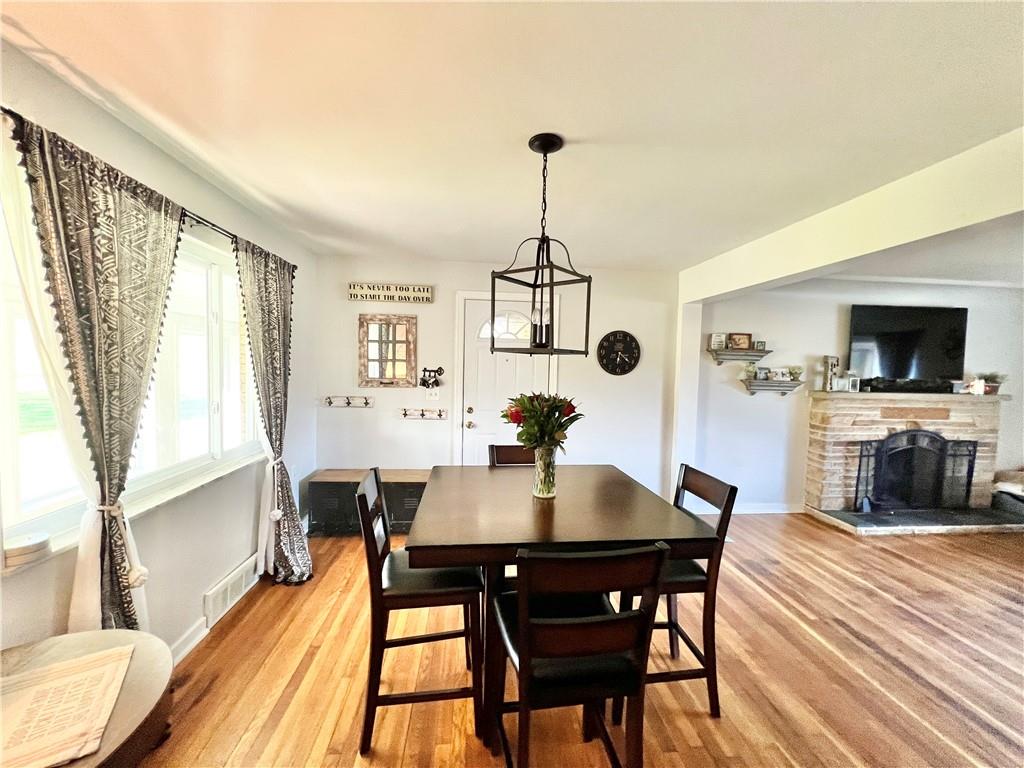2175 Frew Mill Road New Castle, PA 16101 - Photo 9 of 25 a view of a dining room with furniture window and wooden floor