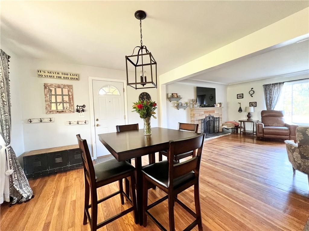 2175 Frew Mill Road New Castle, PA 16101 - Photo 10 of 25 a view of a dining room with furniture window and wooden floor