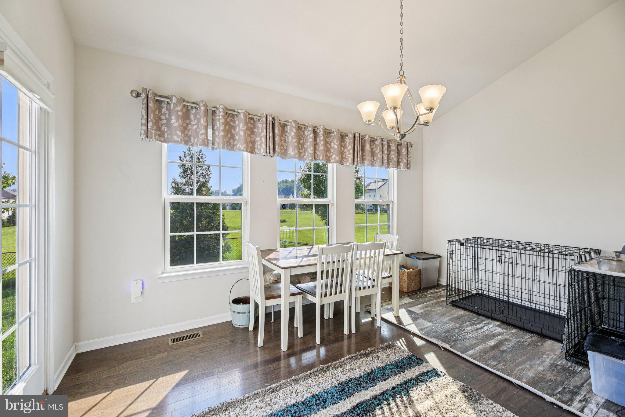 5733 Allender Road White Marsh, MD 21162 - Photo 16 of 47 a view of a dining room with furniture window and outside view