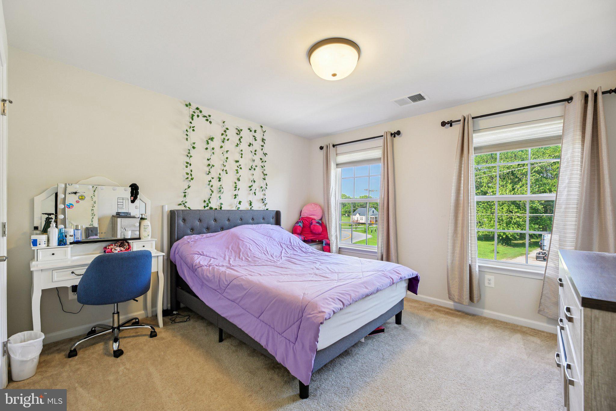 5733 Allender Road White Marsh, MD 21162 - Photo 22 of 47 a bed room with a bed and a desk