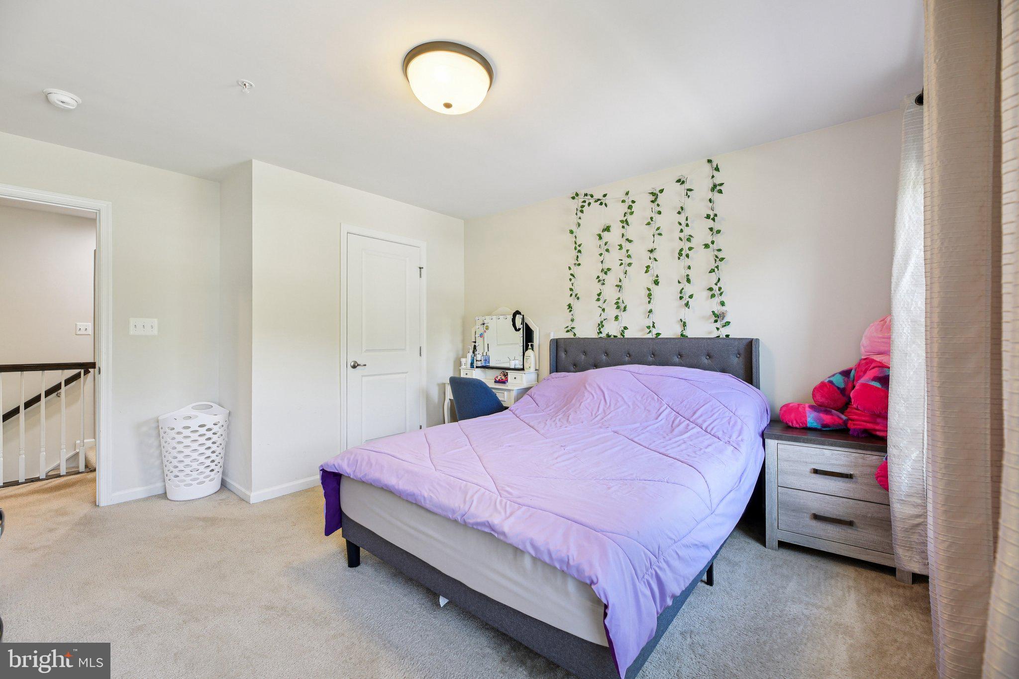 5733 Allender Road White Marsh, MD 21162 - Photo 23 of 47 a bedroom with a bed and a dresser