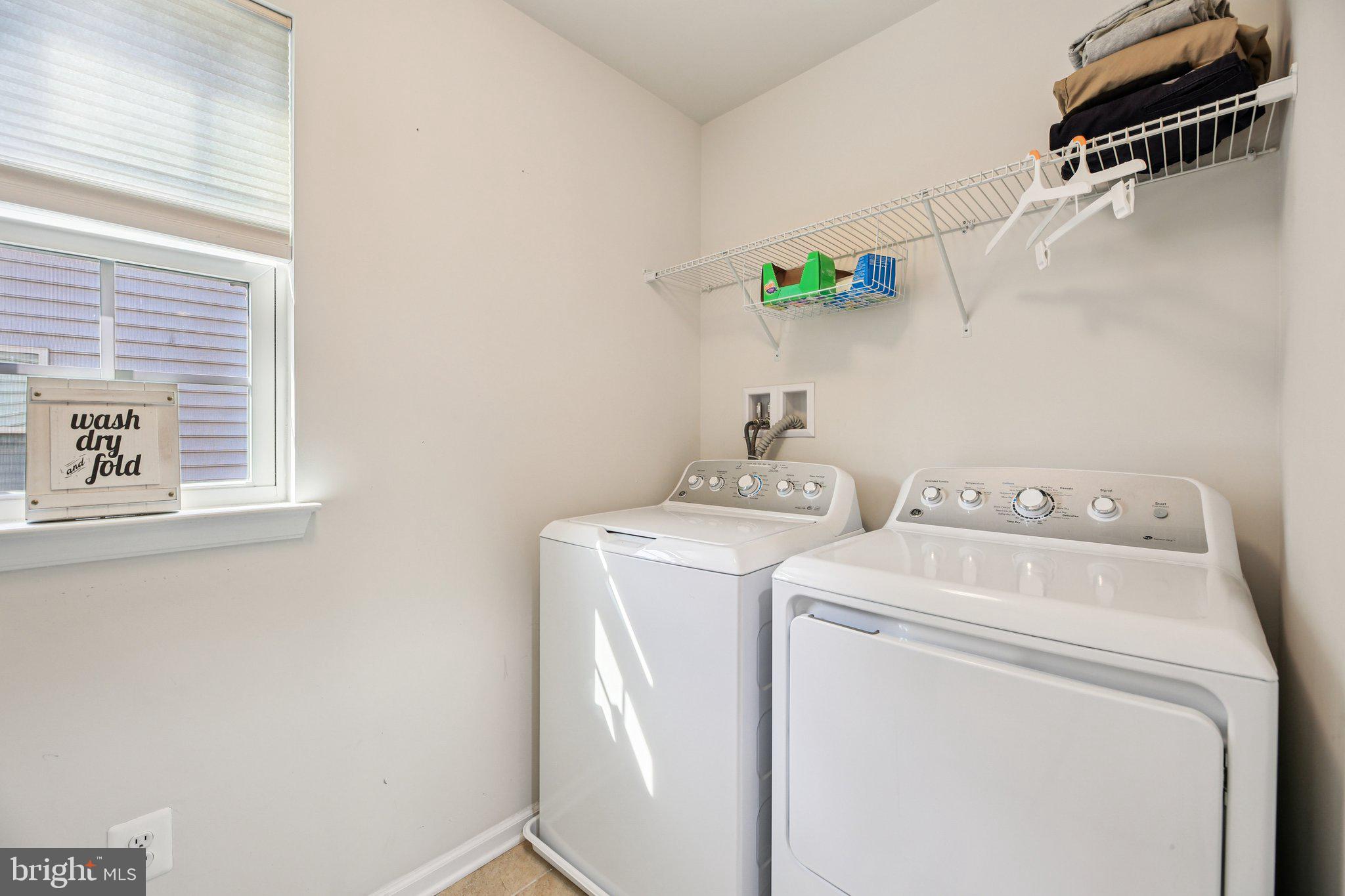 5733 Allender Road White Marsh, MD 21162 - Photo 27 of 47 a utility room with dryer and washer