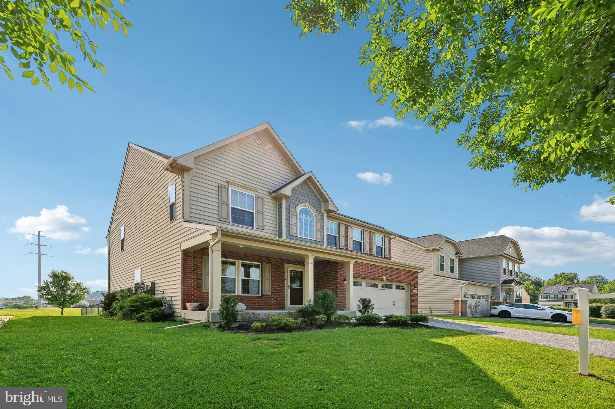 5733 Allender Road White Marsh, MD 21162 - Photo 4 of 47 a front view of a house with a yard