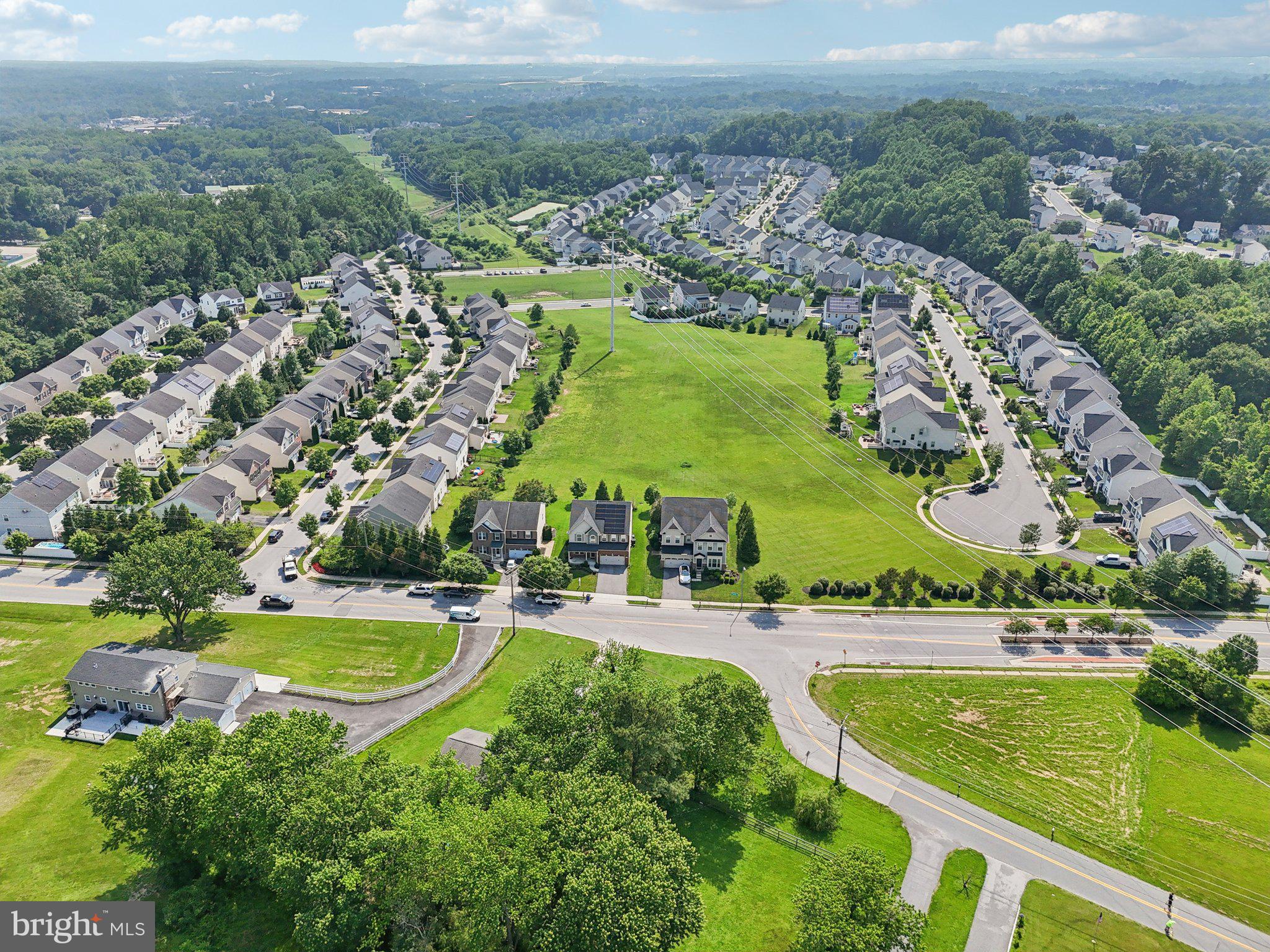 5733 Allender Road White Marsh, MD 21162 - Photo 42 of 47 an aerial view of residential houses with outdoor space and swimming pool