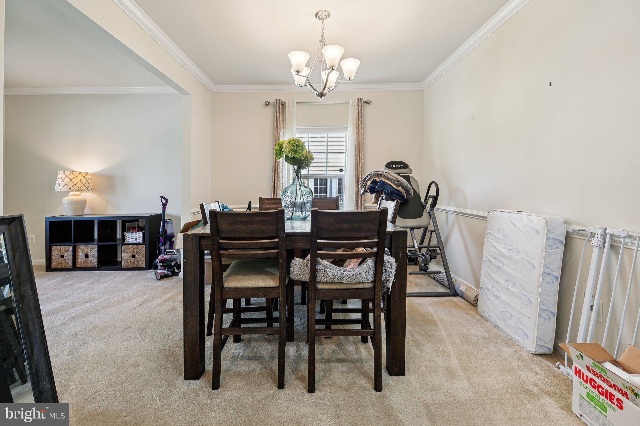 5733 Allender Road White Marsh, MD 21162 - Photo 8 of 47 a view of a dining room with furniture and chandelier