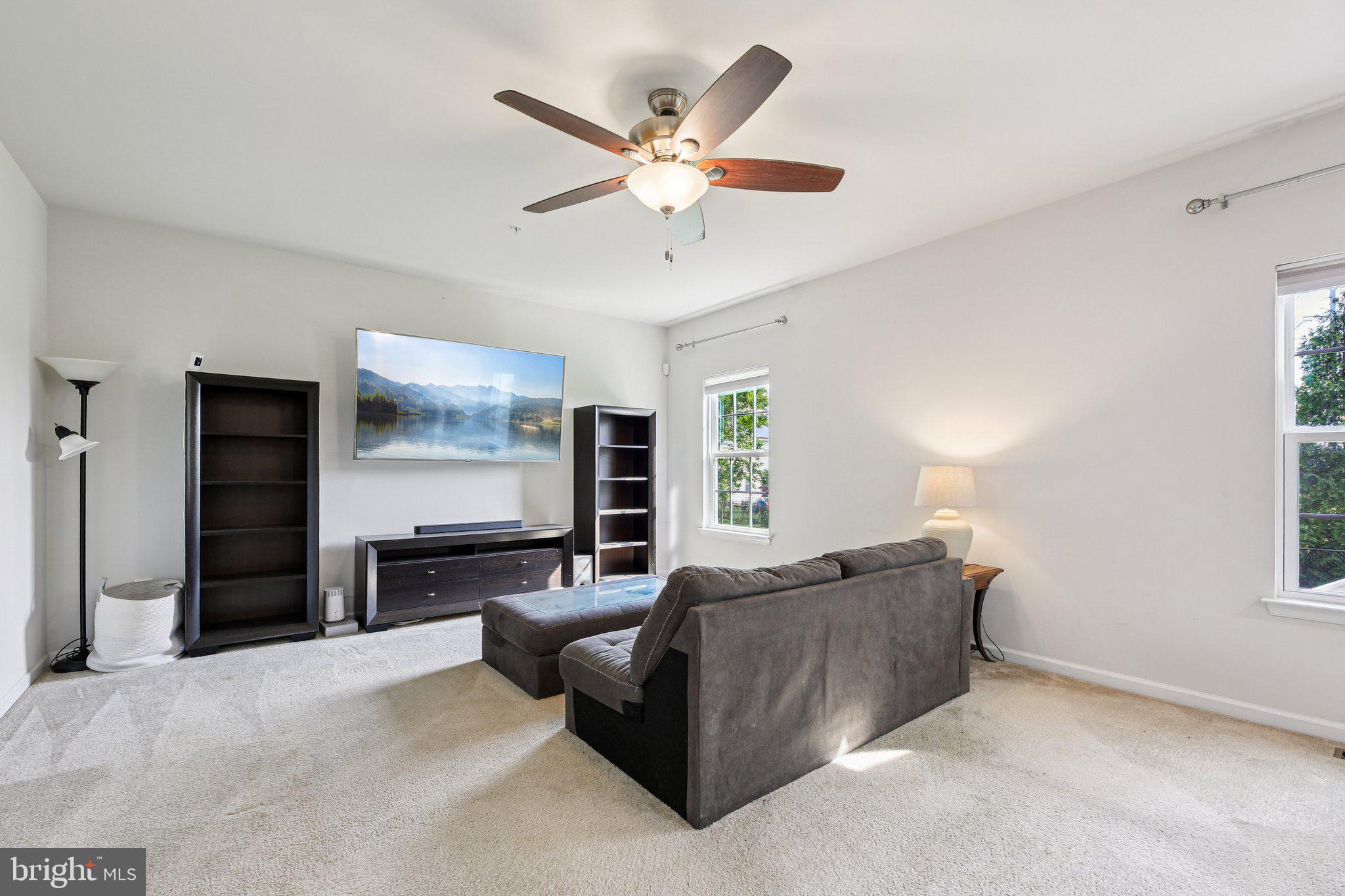 5733 Allender Road White Marsh, MD 21162 - Photo 9 of 47 a living room with furniture window and a ceiling fan