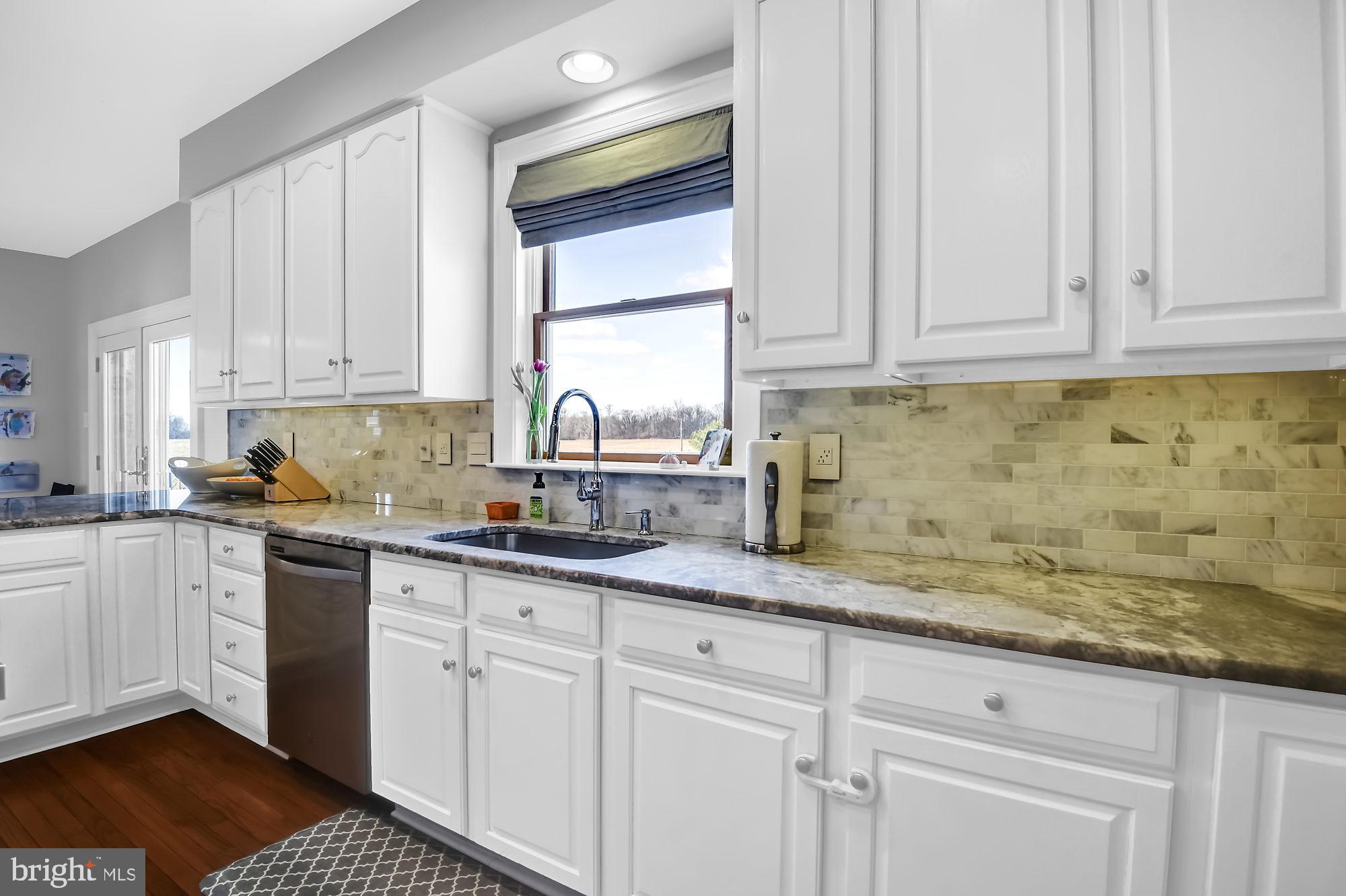 1436 Freeland Road Freeland, MD 21053 - Photo 9 of 49 Kitchen cabinets and backsplash
