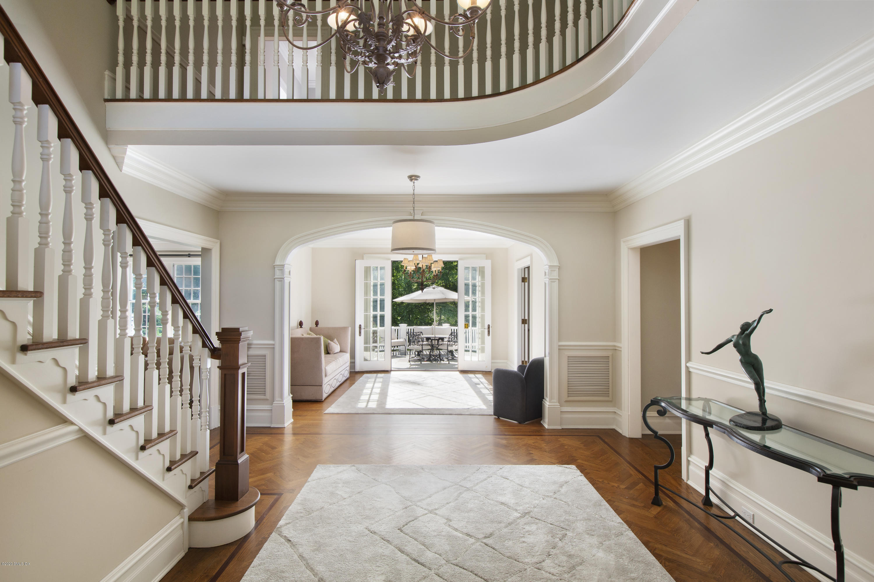 69 Porchuck Road Greenwich, CT 06831 - Photo 3 of 21 a view of an entryway wooden floor and a rug