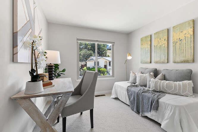 1129 Rainier Avenue Pacifica, CA 94044 - Photo 18 of 41 a living room with furniture and a window