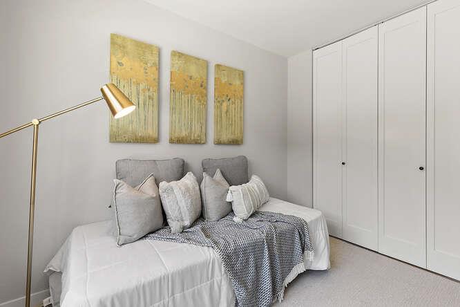 1129 Rainier Avenue Pacifica, CA 94044 - Photo 19 of 41 a bedroom with a bed and a painting