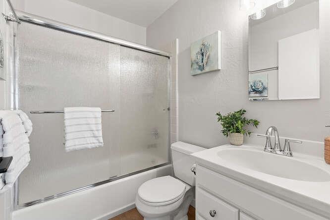 1129 Rainier Avenue Pacifica, CA 94044 - Photo 20 of 41 a bathroom with a sink toilet and shower
