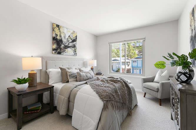 1129 Rainier Avenue Pacifica, CA 94044 - Photo 21 of 41 a bedroom with bed couch and window