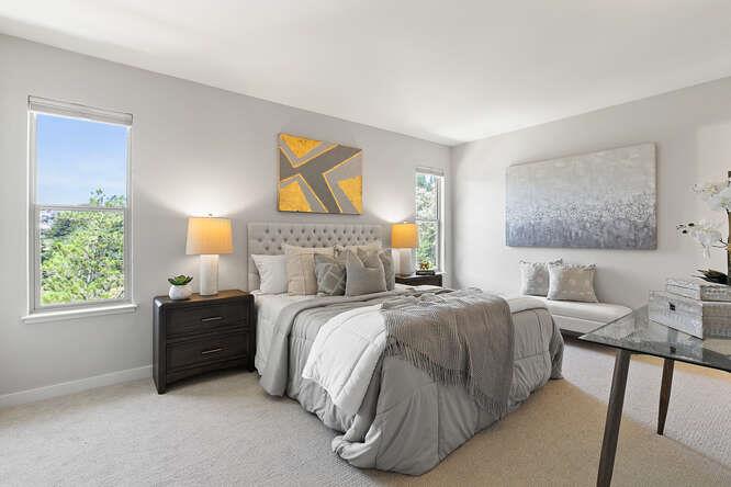 1129 Rainier Avenue Pacifica, CA 94044 - Photo 23 of 41 a bedroom with a bed and a painting on the wall