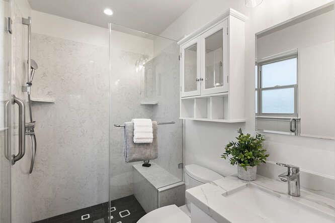 1129 Rainier Avenue Pacifica, CA 94044 - Photo 25 of 41 a bathroom with a sink toilet and shower
