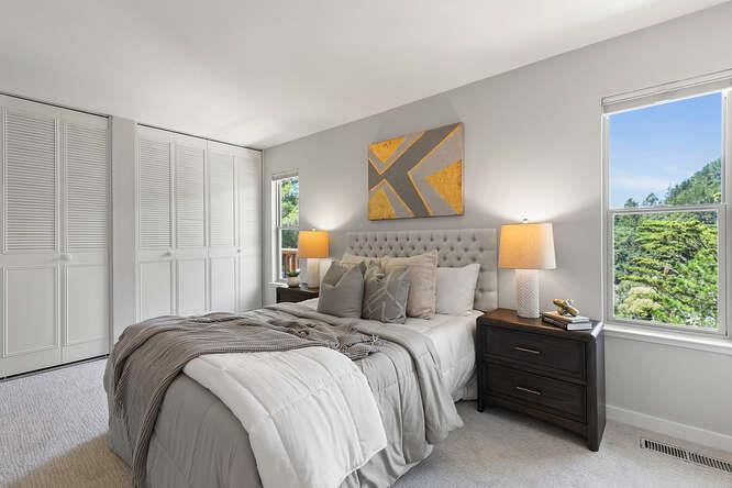 1129 Rainier Avenue Pacifica, CA 94044 - Photo 26 of 41 a bedroom with a bed and a window