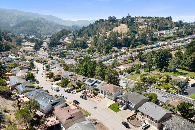 1129 Rainier Avenue Pacifica, CA 94044 - Photo 38 of 41 an aerial view of a house with a lot of trees