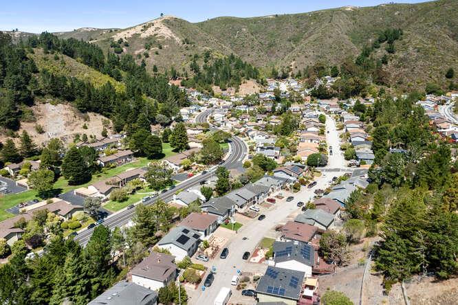 1129 Rainier Avenue Pacifica, CA 94044 - Photo 39 of 41 a view of a city with mountains in the background