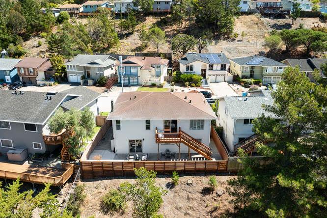 1129 Rainier Avenue Pacifica, CA 94044 - Photo 4 of 41 an aerial view of multiple houses with a yard