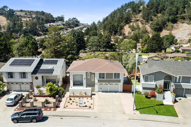 1129 Rainier Avenue Pacifica, CA 94044 - Photo 41 of 41 a front view of a house with garden