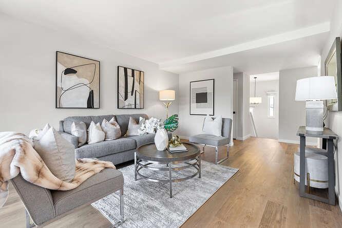1129 Rainier Avenue Pacifica, CA 94044 - Photo 7 of 41 a living room with furniture a wooden floor and next to a lamp