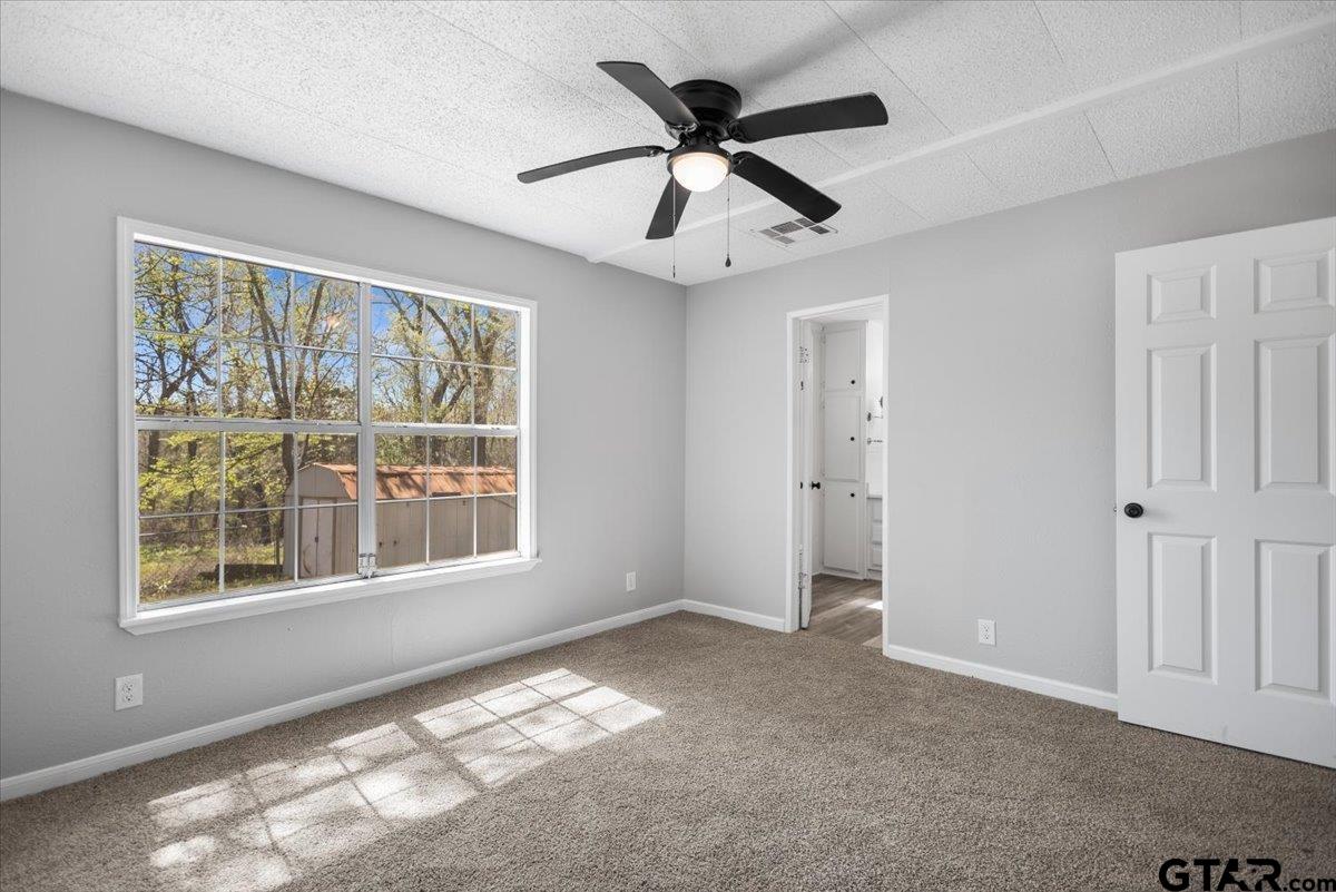 18607-c R 498 C R 498 Lindale, TX 75771 - Photo 30 of 41 a view of an empty room with a window
