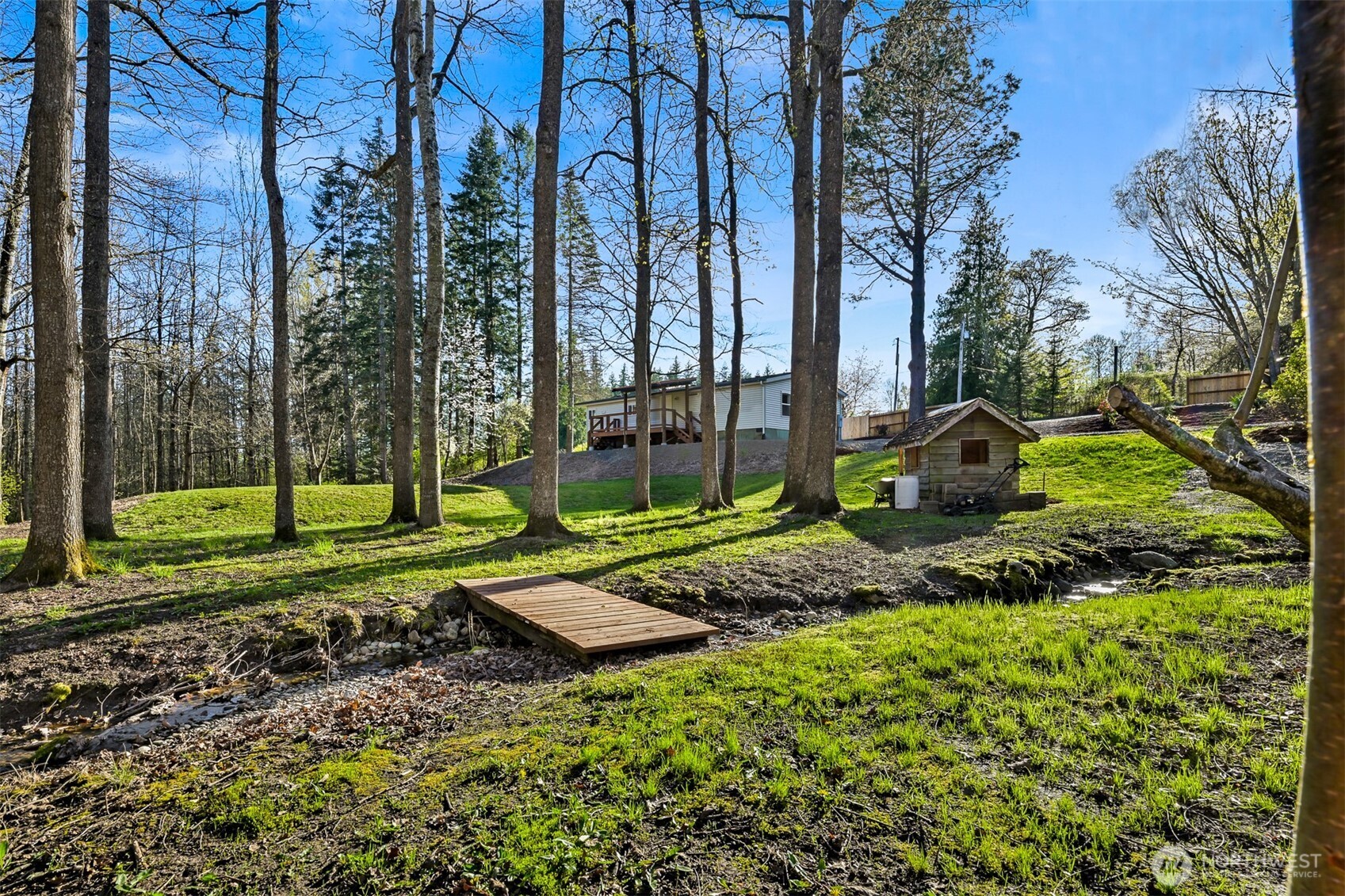 4930 Noon Road Bellingham, WA 98226 - Photo 18 of 27 a view of a backyard with a garden