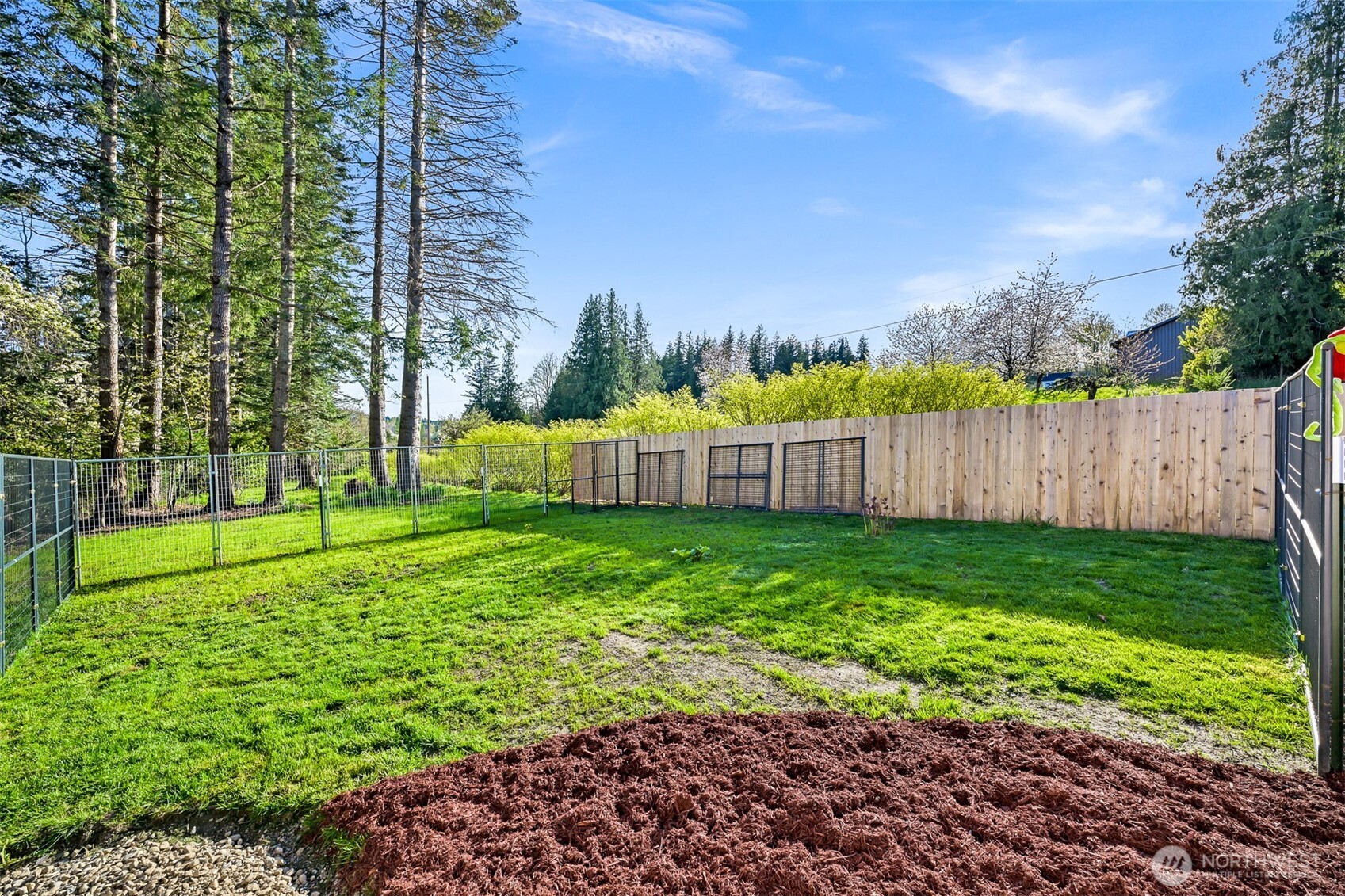 4930 Noon Road Bellingham, WA 98226 - Photo 25 of 27 a view of a yard with a fence