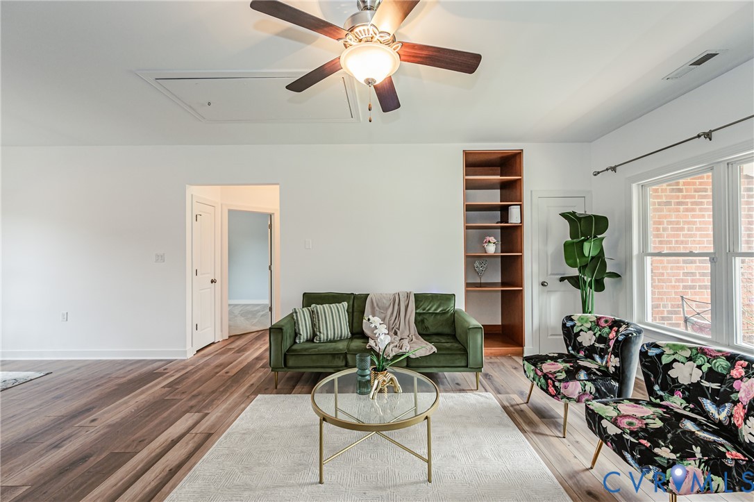 2018 Valentine Road Henrico, VA 23228 - Photo 15 of 65 a living room with furniture potted plant and a window