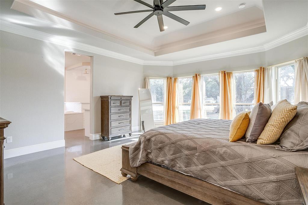 3207 Hummingbird Court Granbury, TX 76049 - Photo 16 of 40 a bedroom with a bed and window