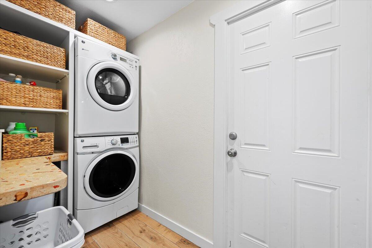 119 Elsa Road Jupiter, FL 33477 - Photo 32 of 44 a utility room with dryer and washer