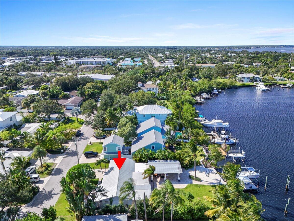 119 Elsa Road Jupiter, FL 33477 - Photo 6 of 44 an aerial view of multiple house
