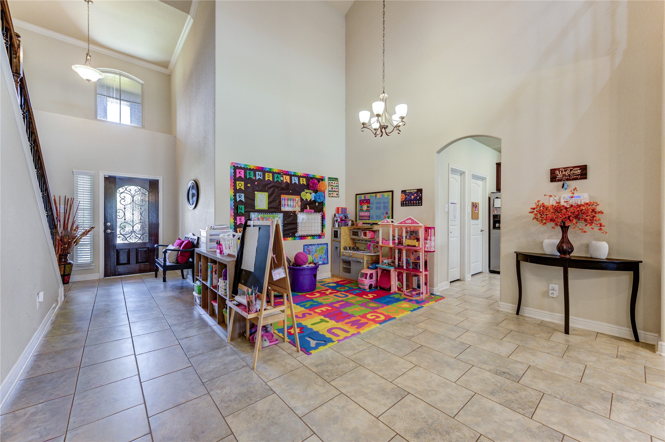 24511 Stratton Creek Drive Spring, TX 77373 - Photo 5 of 27 This spacious dining area is presently used as a children's study and playroom, offering endless possibilities for dining, a home office, or additional living space.