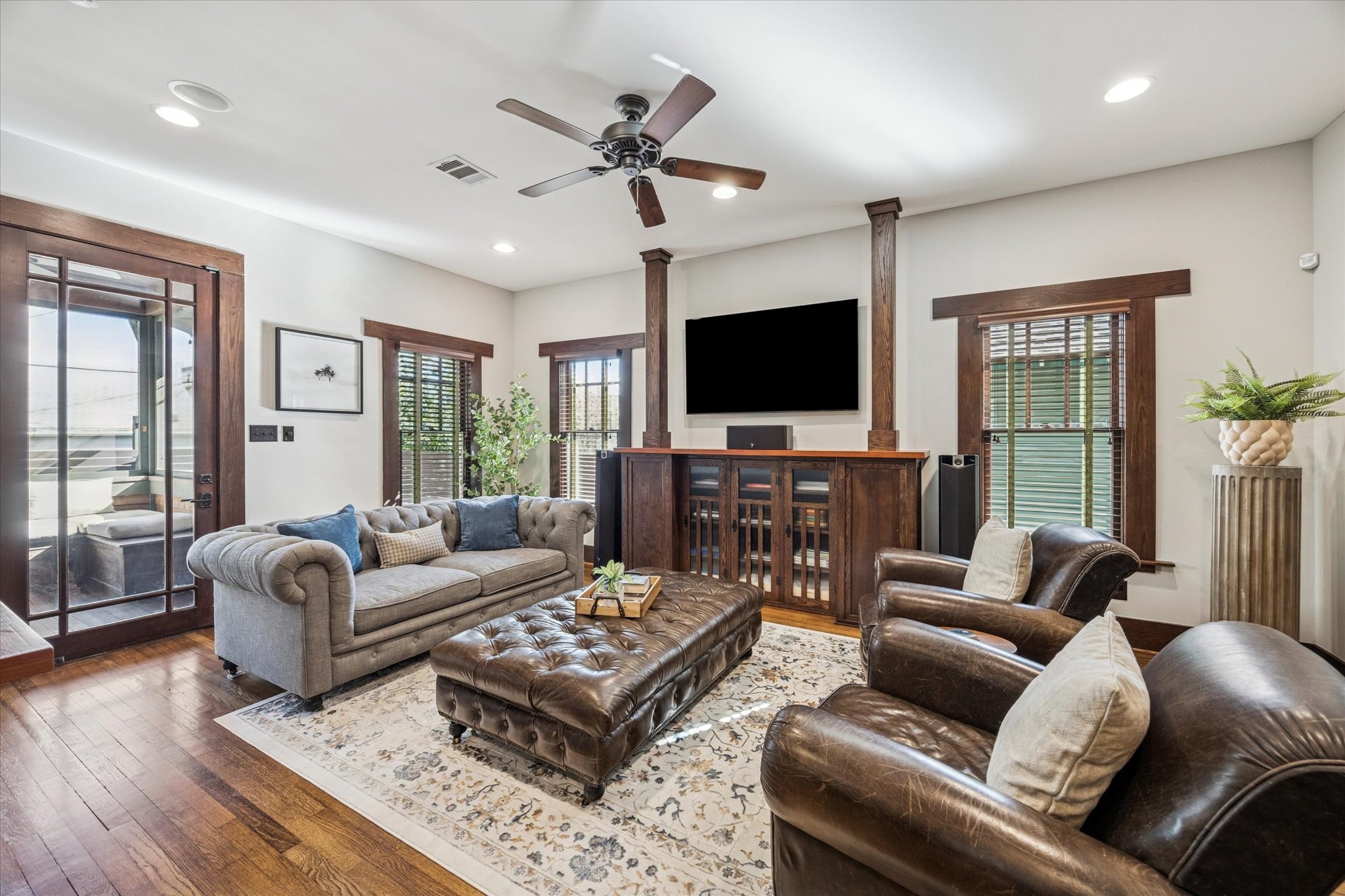 512 Archer Street Houston, TX 77009 - Photo 11 of 40 The living room features oak built-ins that was designed to suggest a fireplace mantle.