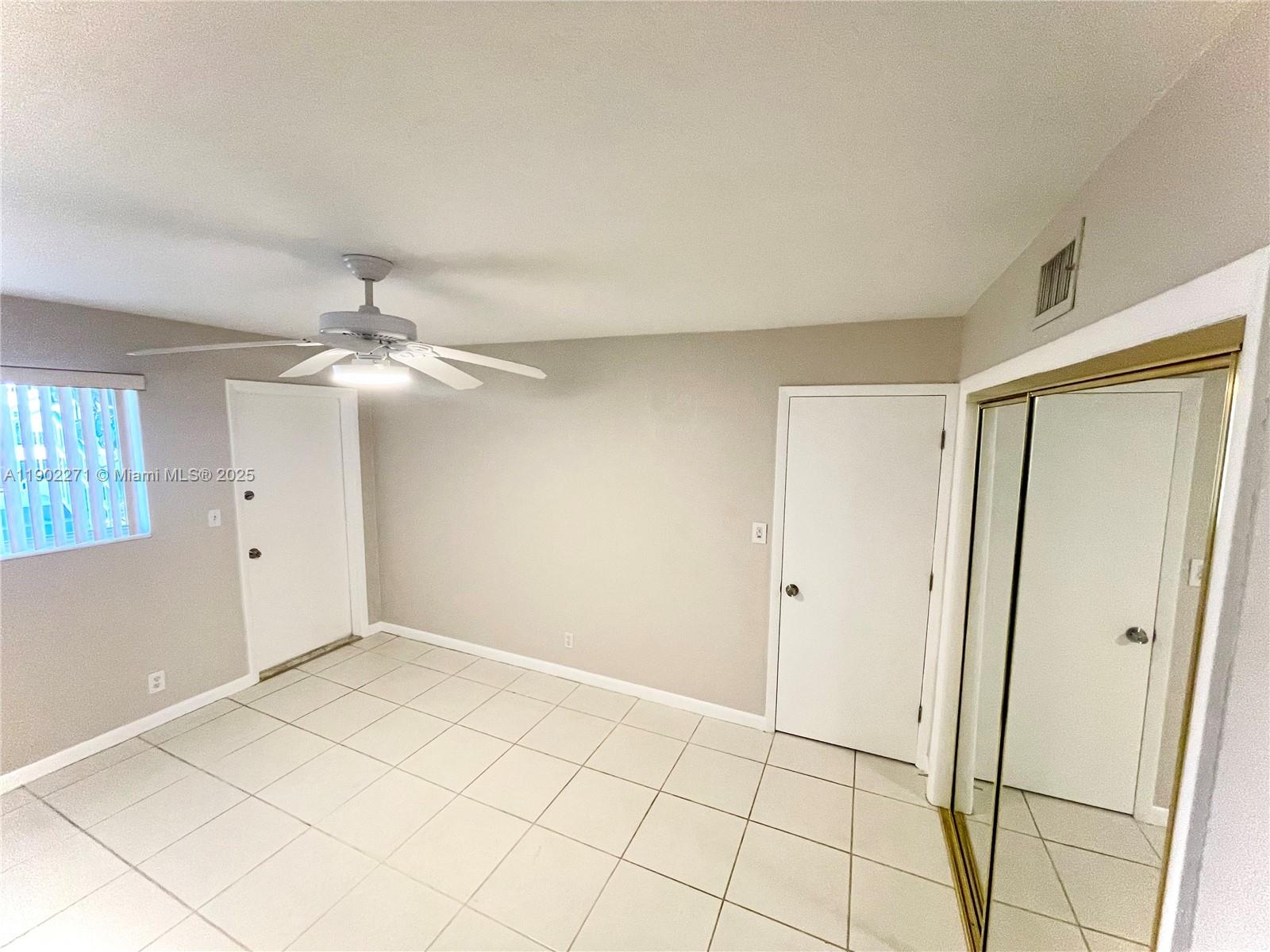 2175 Northeast 56th Street, Unit 105 Fort Lauderdale, FL 33308 - Photo 5 of 26 a view of an empty room