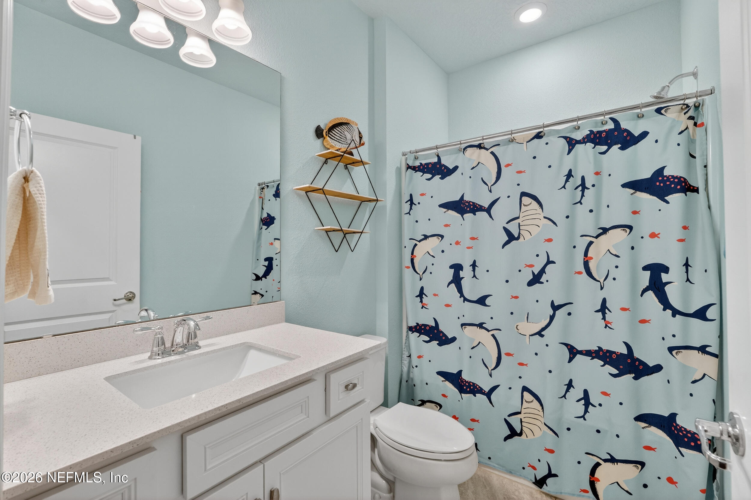 4558 Farmhouse Gate Trail Jacksonville, FL 32226 - Photo 18 of 34 a bathroom with a sink toilet and shower