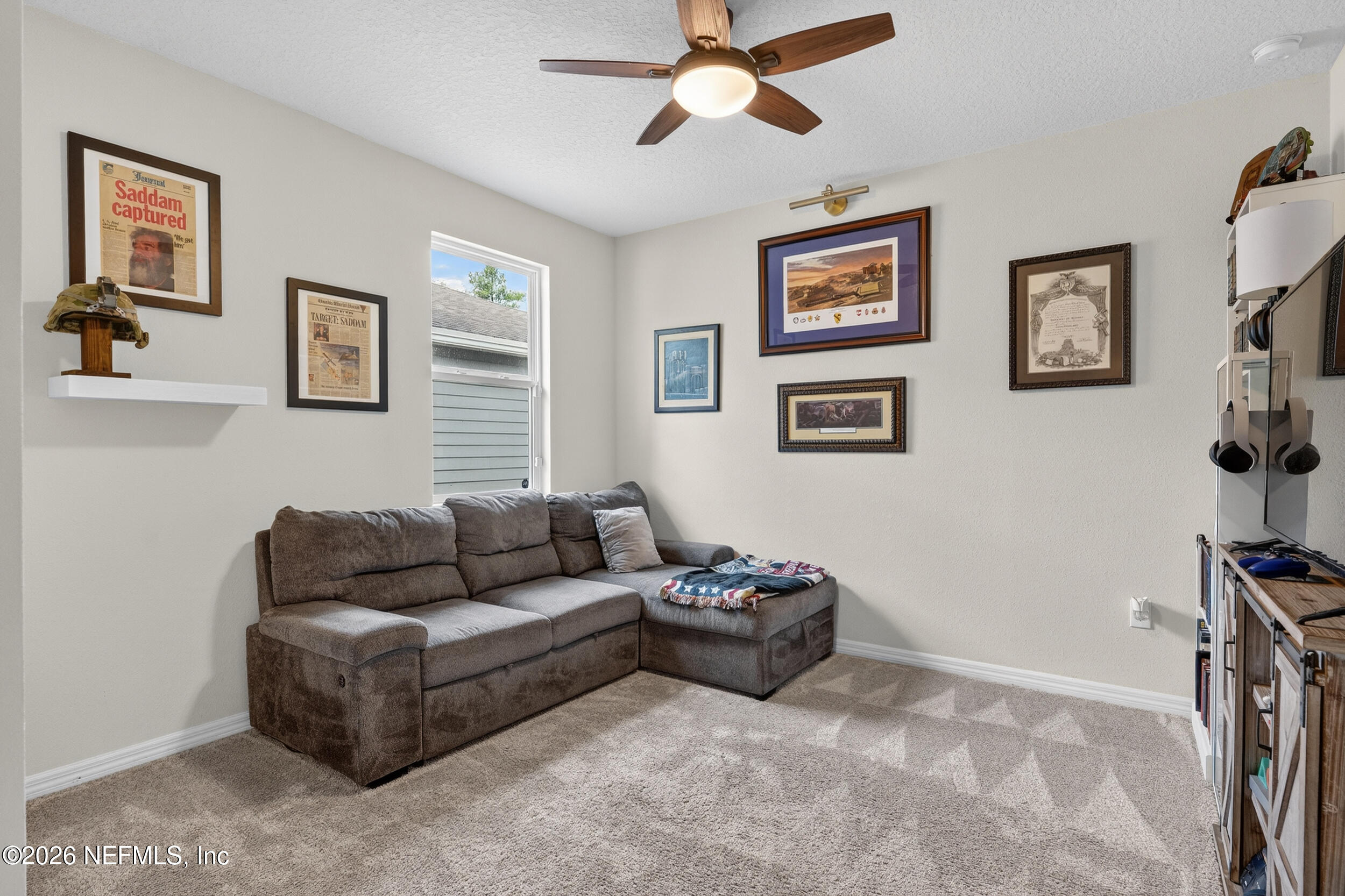 4558 Farmhouse Gate Trail Jacksonville, FL 32226 - Photo 19 of 34 a living room with furniture and a window