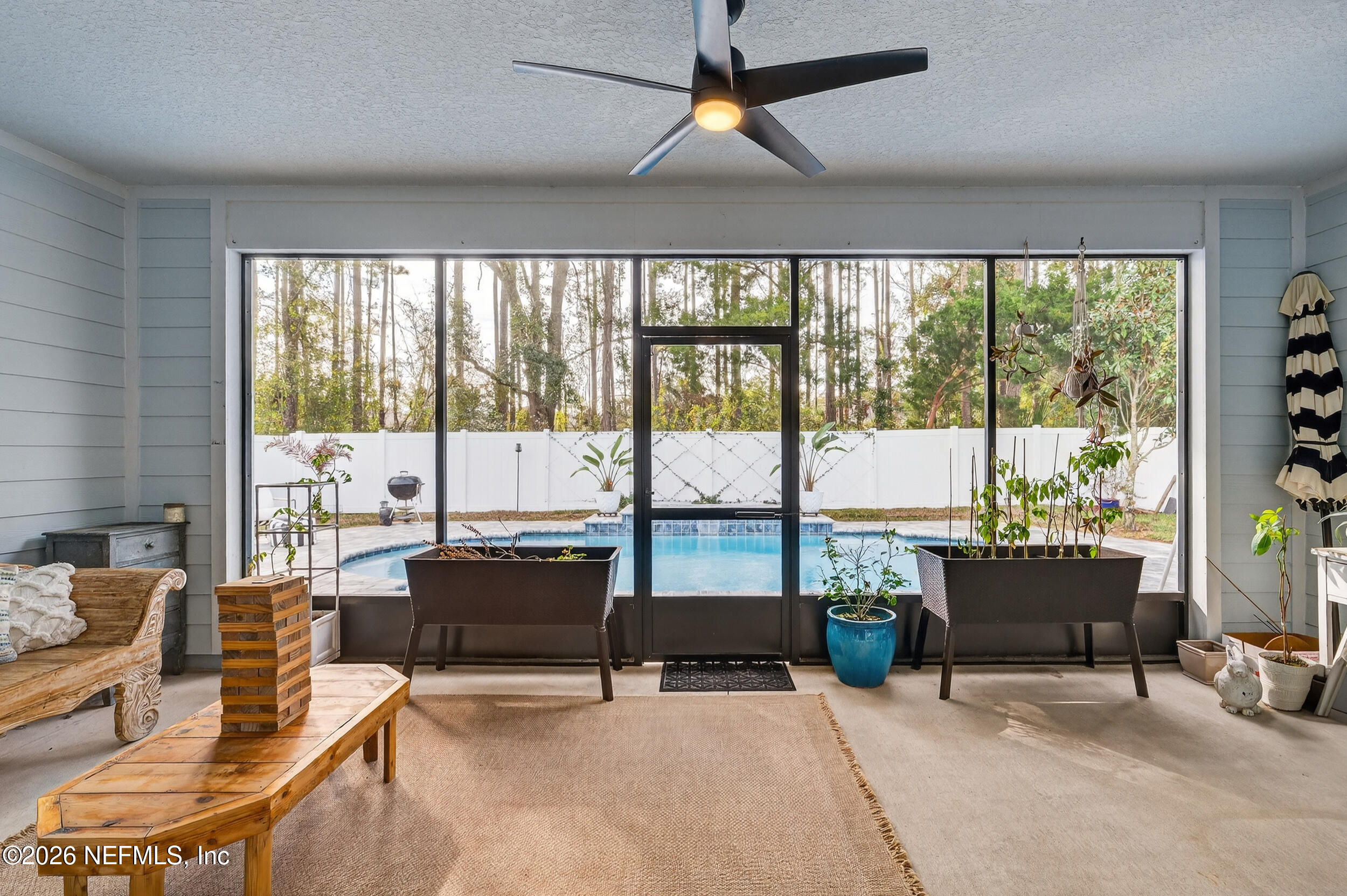 4558 Farmhouse Gate Trail Jacksonville, FL 32226 - Photo 22 of 34 a living room with furniture and a window