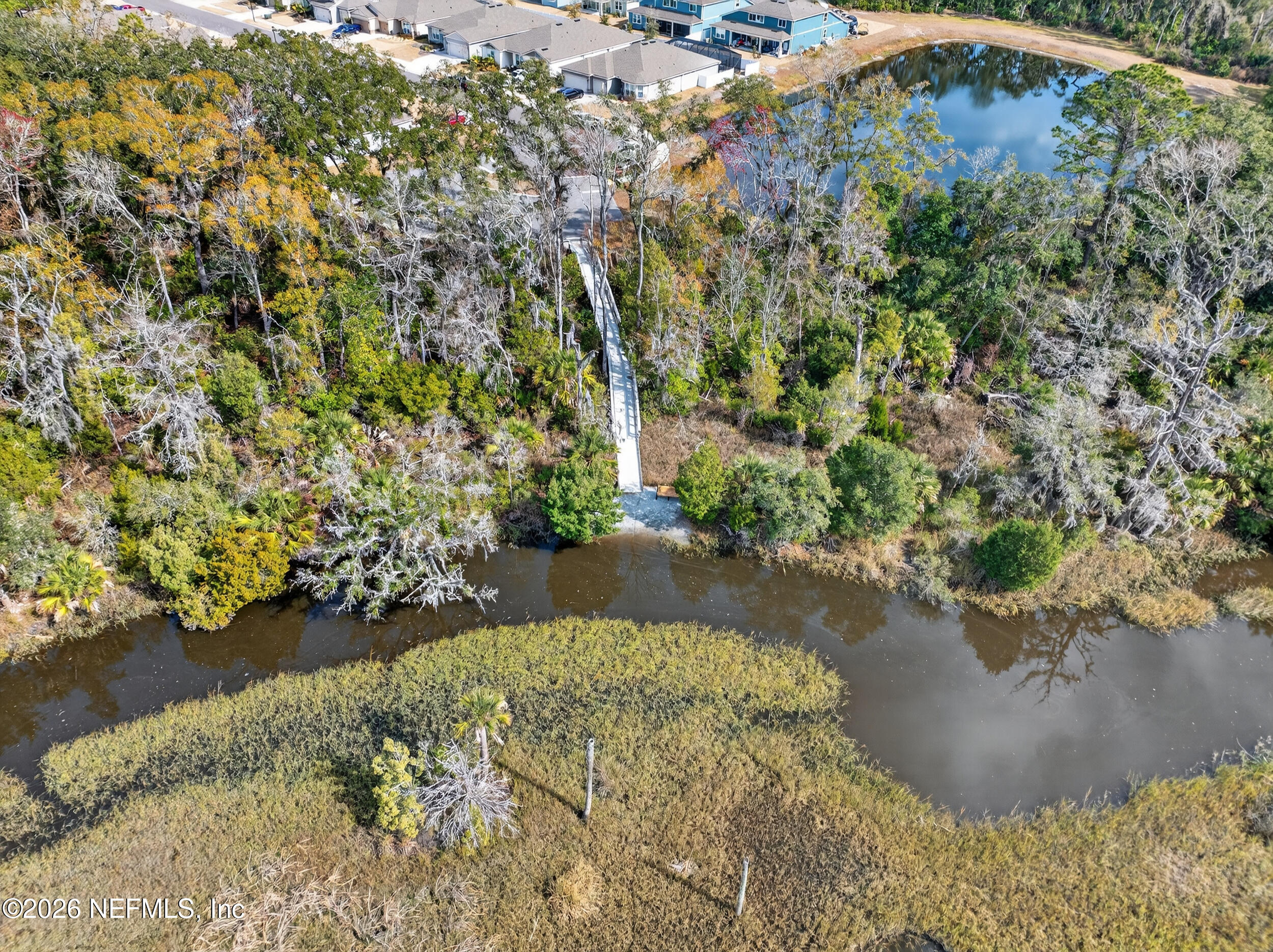 4558 Farmhouse Gate Trail Jacksonville, FL 32226 - Photo 31 of 34 a view of lake background with houses