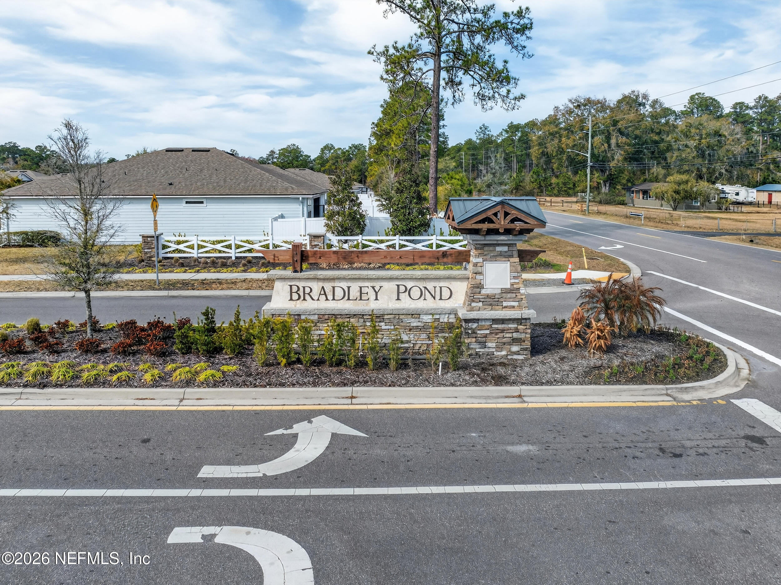 4558 Farmhouse Gate Trail Jacksonville, FL 32226 - Photo 32 of 34 a view of a water fountain and a big yard