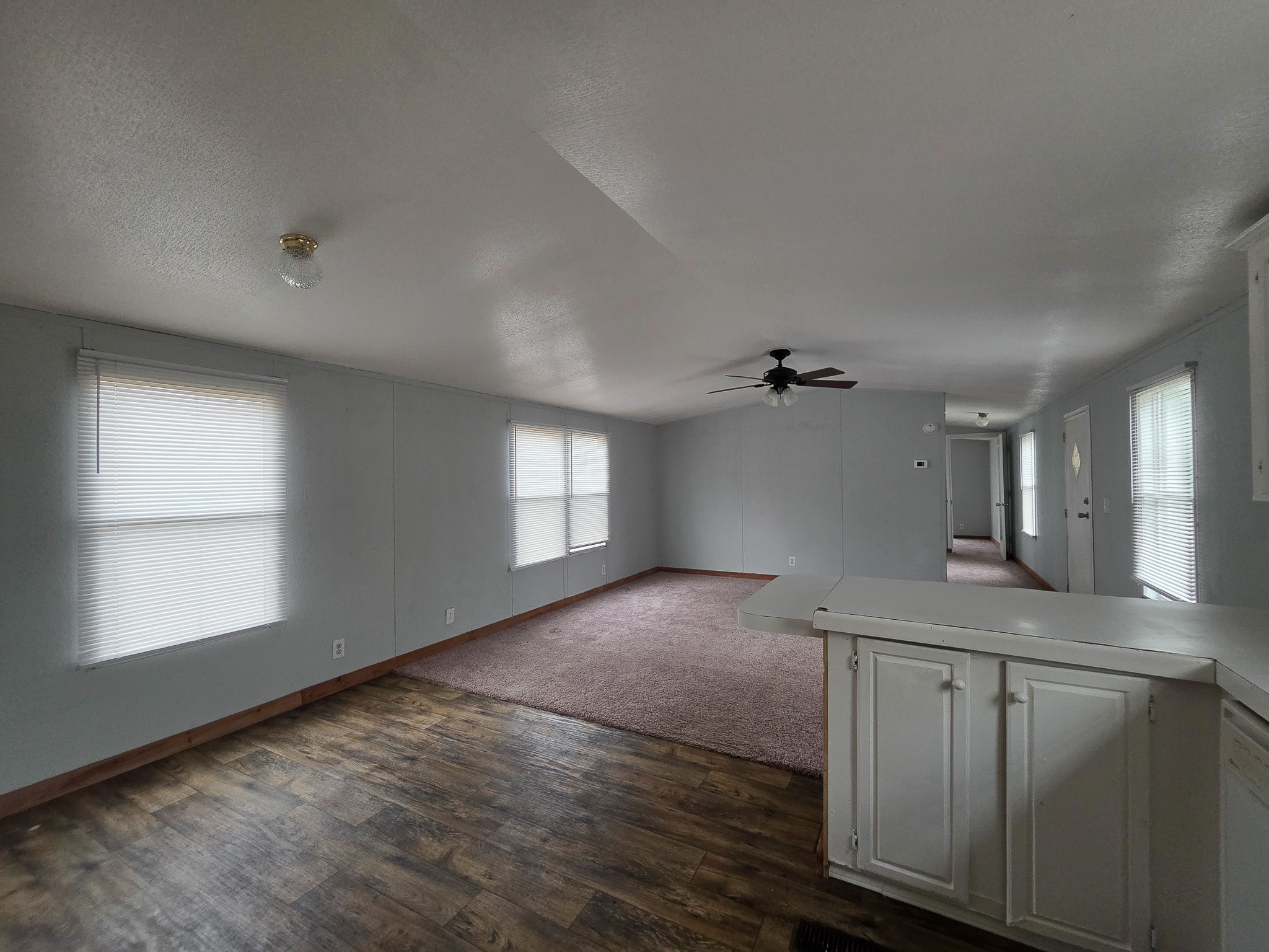 344 Holmes Road Onalaska, TX 77360 - Photo 3 of 25 331 Holmes Kitchen view into the living room